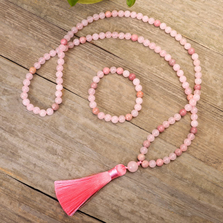 Braccialetto con nappa di cristallo rosa e 108 perle di Mala Buddha Stones