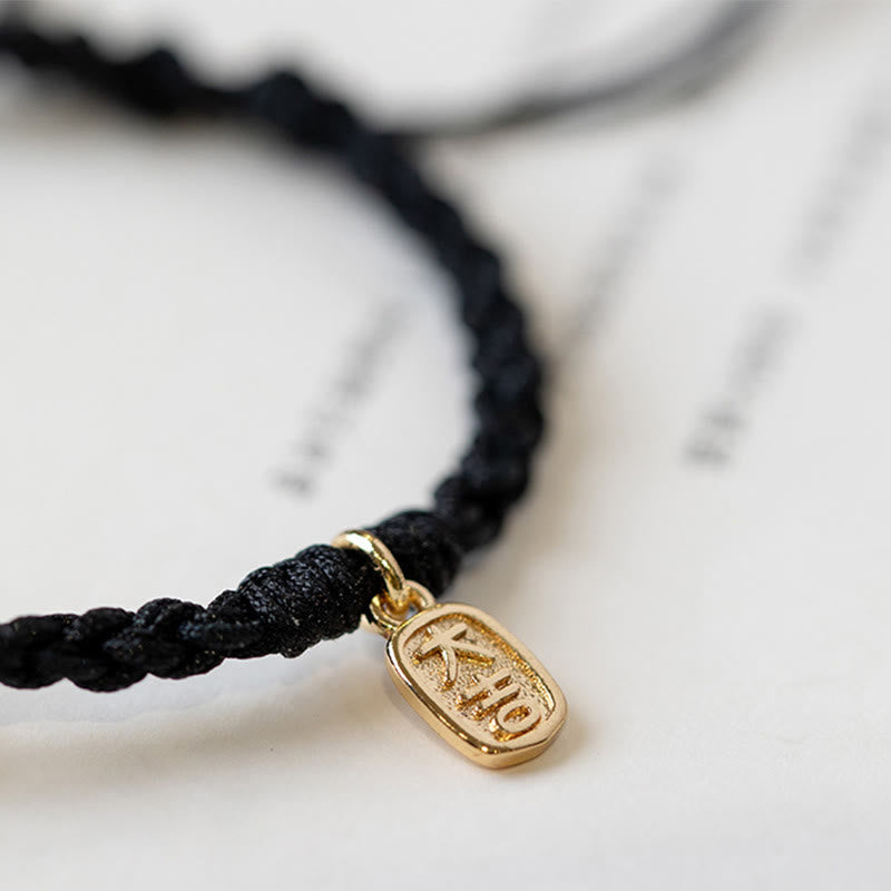 Braccialetto con corda positiva con fibbia rotonda in calcedonio Buddha Stones