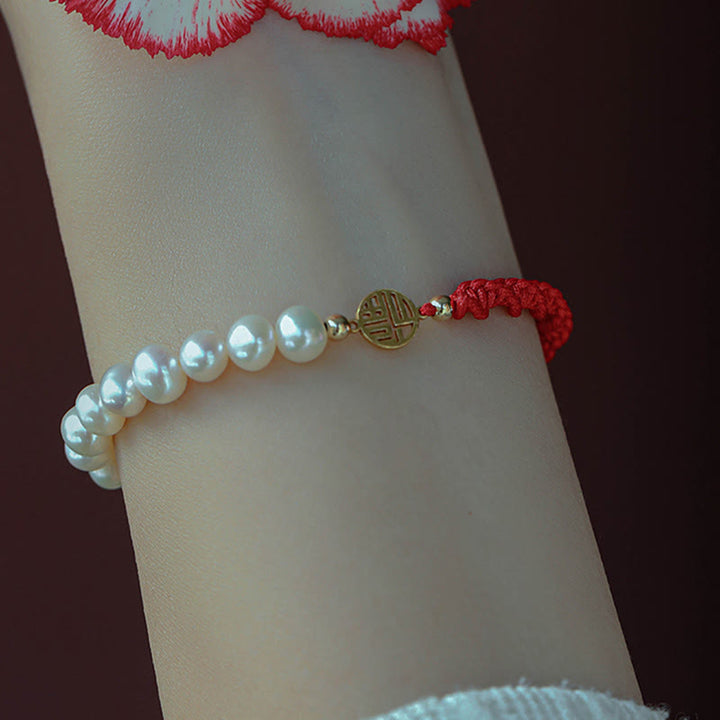 Braccialetto con treccia rossa e perle placcate in oro 14K e protezione dalla fortuna