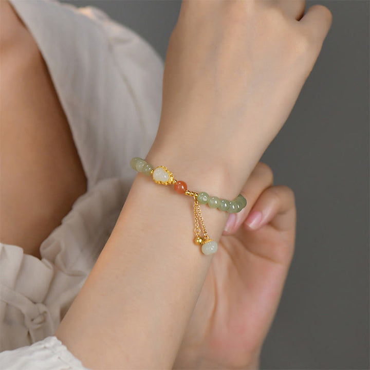 Braccialetto portafortuna in argento sterling 925 con giada Hetian e zucca di loto