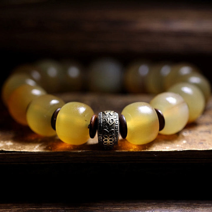 Braccialetto di auspicio Om Mani Padme Hum in corno di pecora tibetano fatto a mano con Buddha Stones