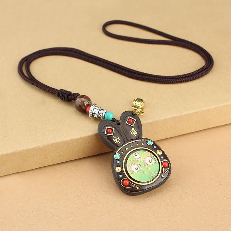 Collana pendente Thangka con cinque divinità della ricchezza in ebano tibetano