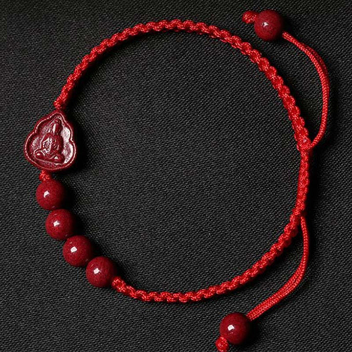 Bracciale con cordino di benedizione Buddha Stones che ride Buddha Avalokitesvara cinabro