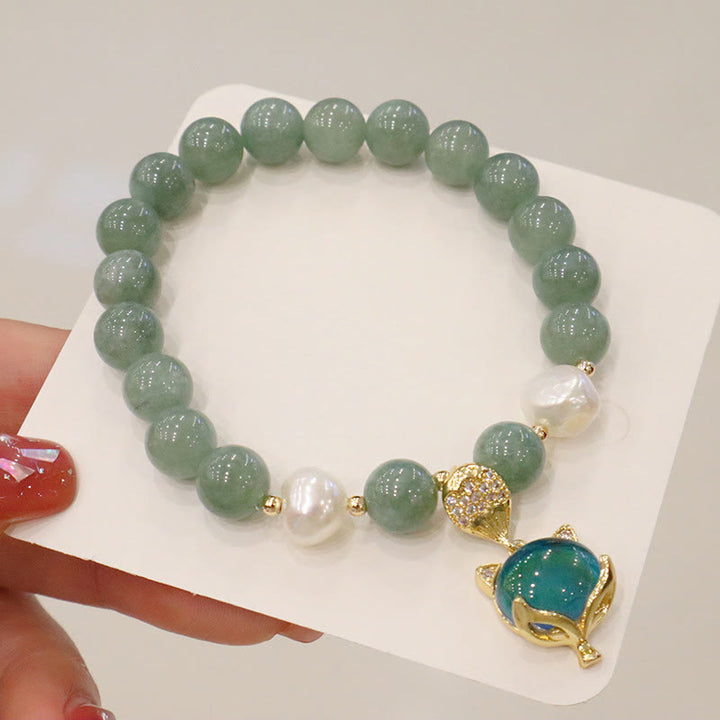 Braccialetto portafortuna con ciondolo volpe che cambia colore, perle di giada e Buddha Stones
