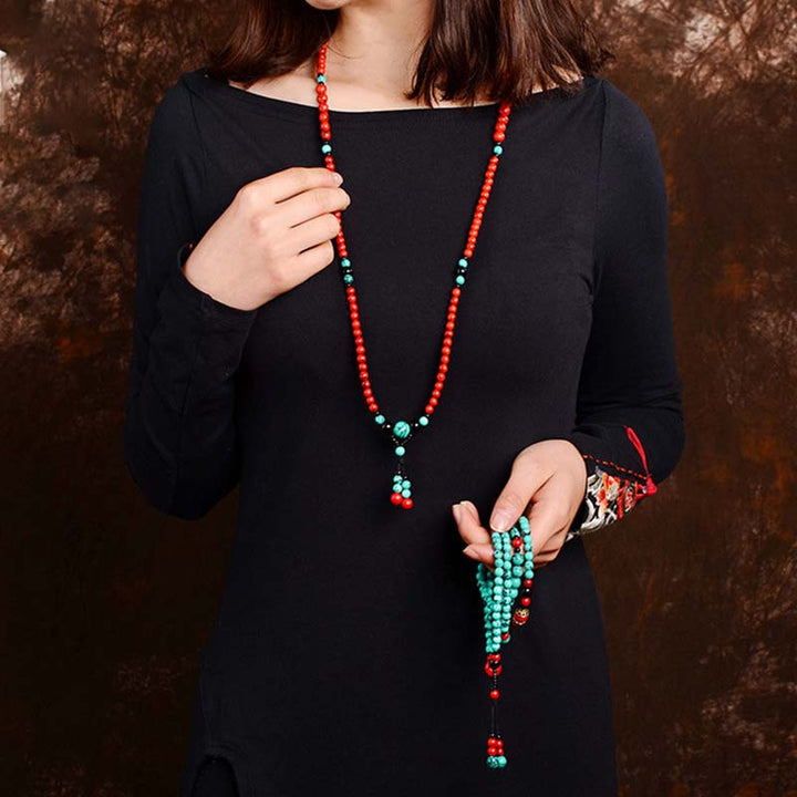Braccialetto di protezione con perline di turchese rosso e onice nero Buddha Stones