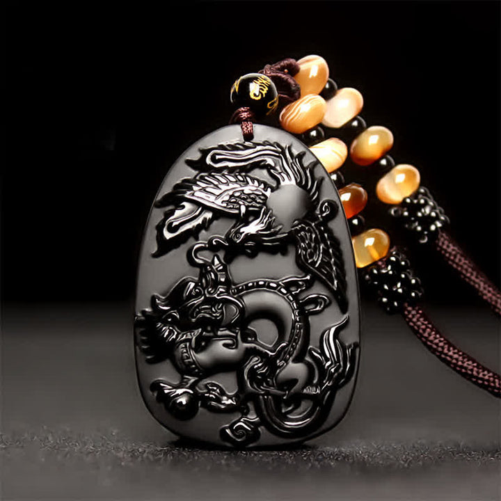 Collana con ciondolo di perline di protezione in ossidiana nera con occhio di tigre, drago e fenice - image 1