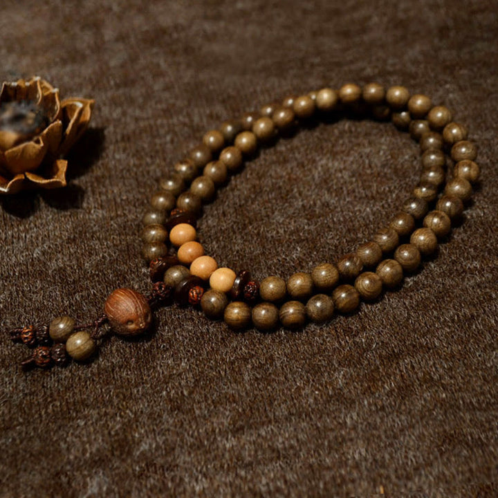 Bracciale Mala con ciondolo di protezione in legno di sandalo tibetano Buddha Stones - image 1