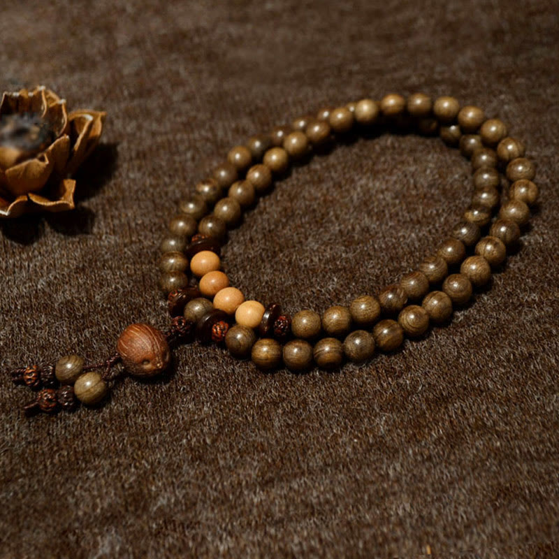 Bracciale Mala con ciondolo di protezione in legno di sandalo tibetano Buddha Stones