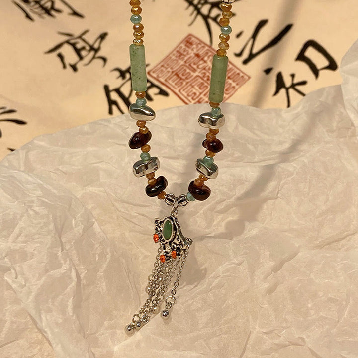 Buddha Stones Pietra di cristallo tibetana Collana pendente con nappa portafortuna in rame
