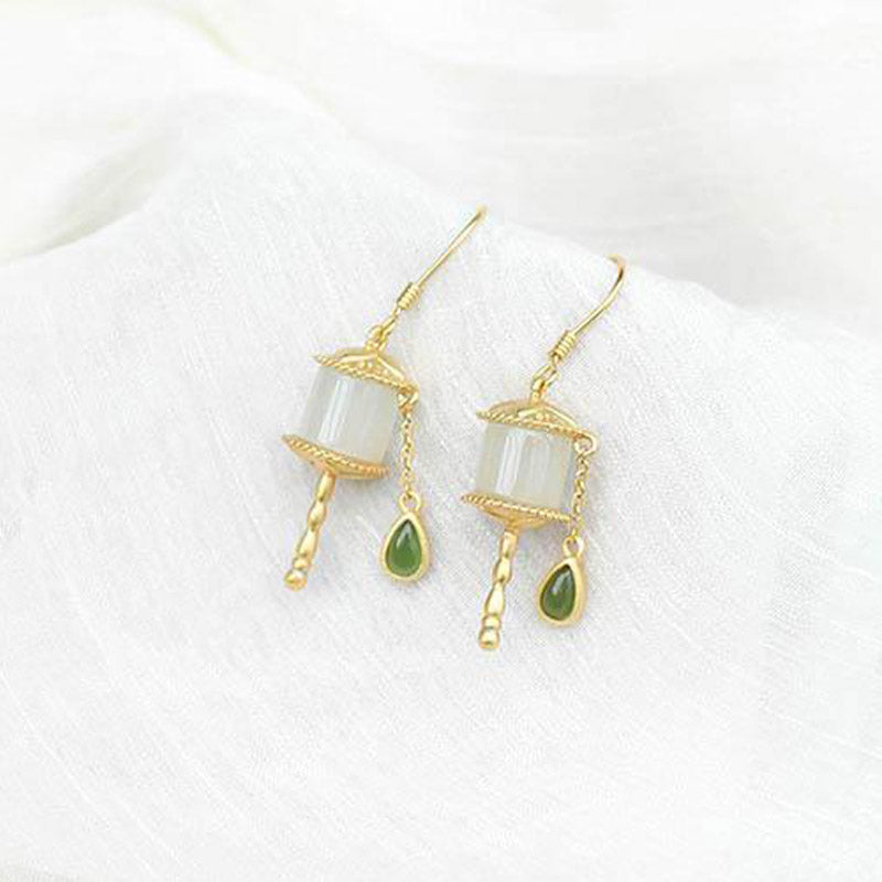 Orecchini pendenti con ruota della preghiera in giada e argento sterling 925 Buddha Stones