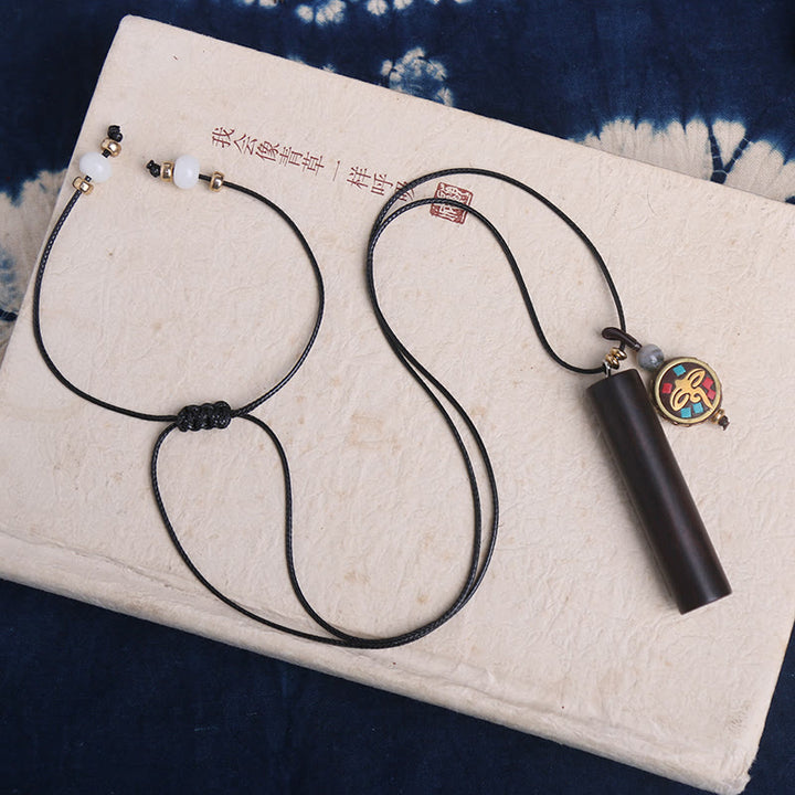 Collana con ciondolo in legno di ebano tibetano Dzi Bead Peace Calm