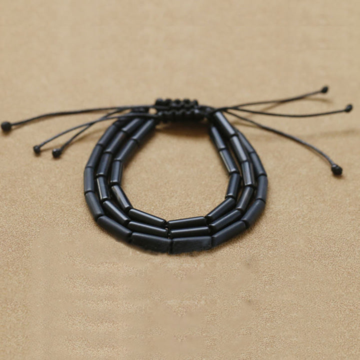 Braccialetto di protezione e supporto con perline di onice nero Buddha Stones