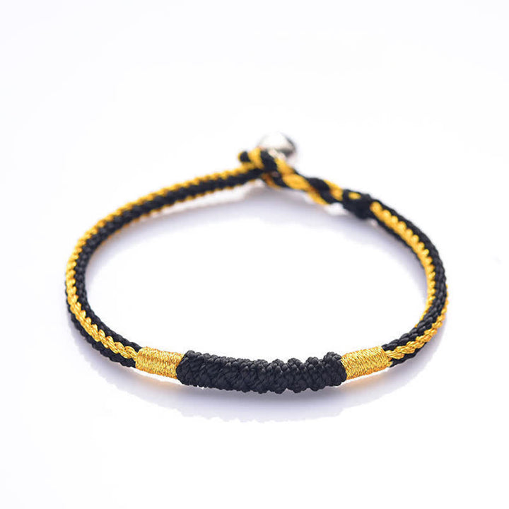 Braccialetto di protezione con corda portafortuna intrecciata fatta a mano in Buddha Stones tibetane