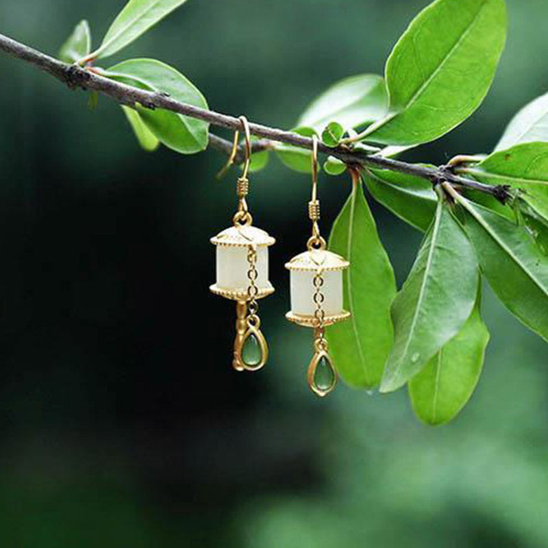 Orecchini pendenti con ruota della preghiera in giada e argento sterling 925 Buddha Stones