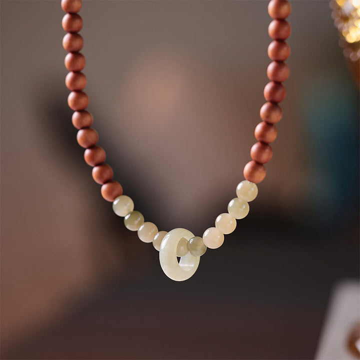 Braccialetto di protezione a doppio giro in giada Hetian e sandalo Buddha Stones