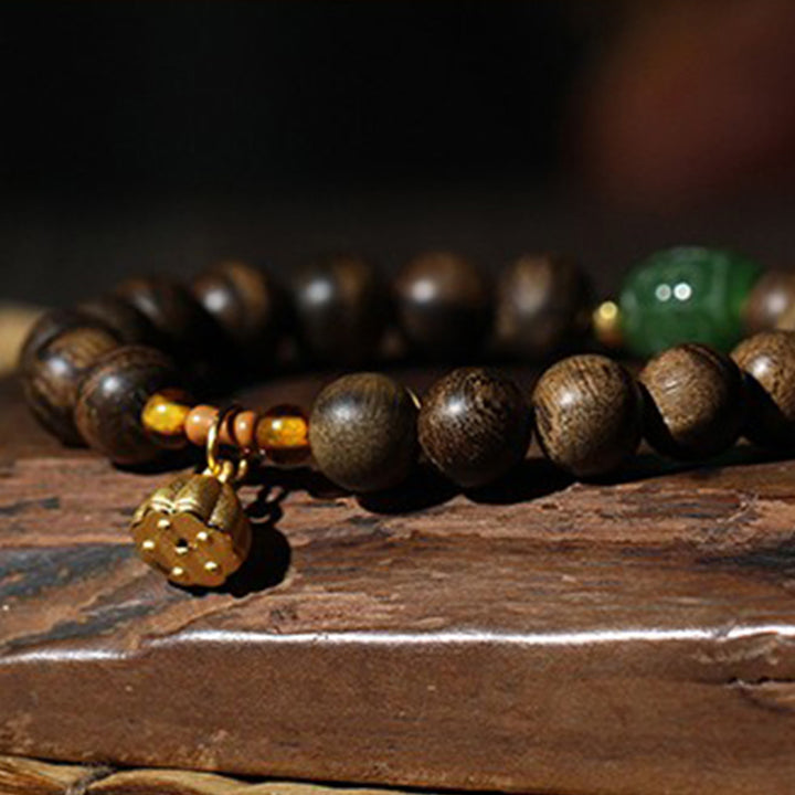 Bracciale Buddha Stones 999 Oro Brunei Agarwood Giada Ciano Fiore di Loto Pace Forza