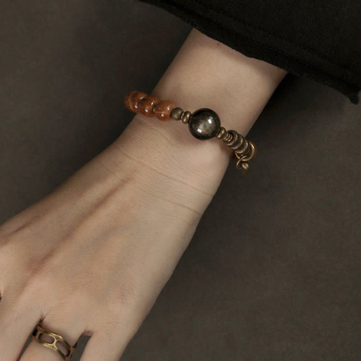 Braccialetto per la fortuna, in ottone, rame e ossidiana , Buddha Stones , semi di Kuka, occhio di tigre e oro lucido - image 13
