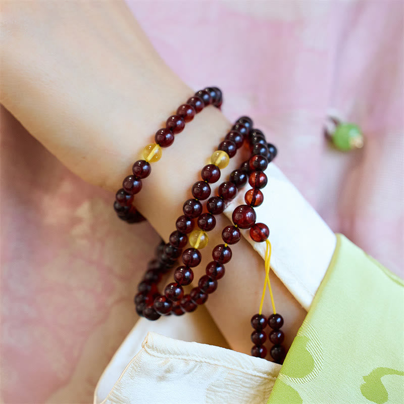 Braccialetto anti-ansia in ambra trasparente con 108 perle di Mala naturali Buddha Stones