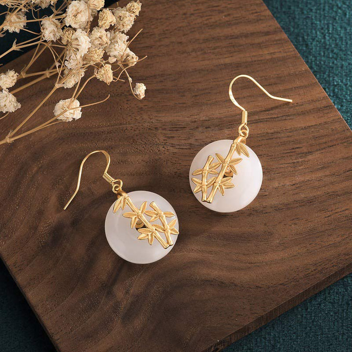 Orecchini Buddha Stones FengShui in giada bianca con fortuna