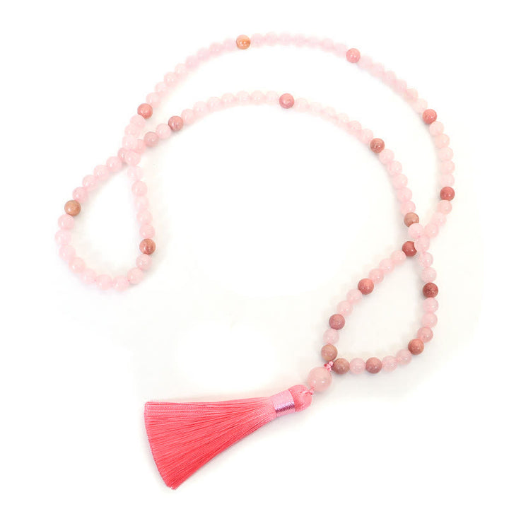 Braccialetto con nappa di cristallo rosa e 108 perle di Mala Buddha Stones