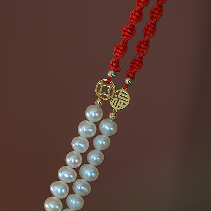 Braccialetto con treccia rossa e perle placcate in oro 14K e protezione dalla fortuna