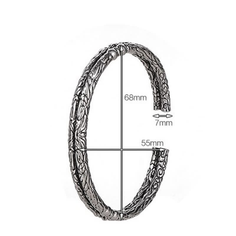 Bracciale rigido con polsino con motivo a drago inciso e bilanciamento