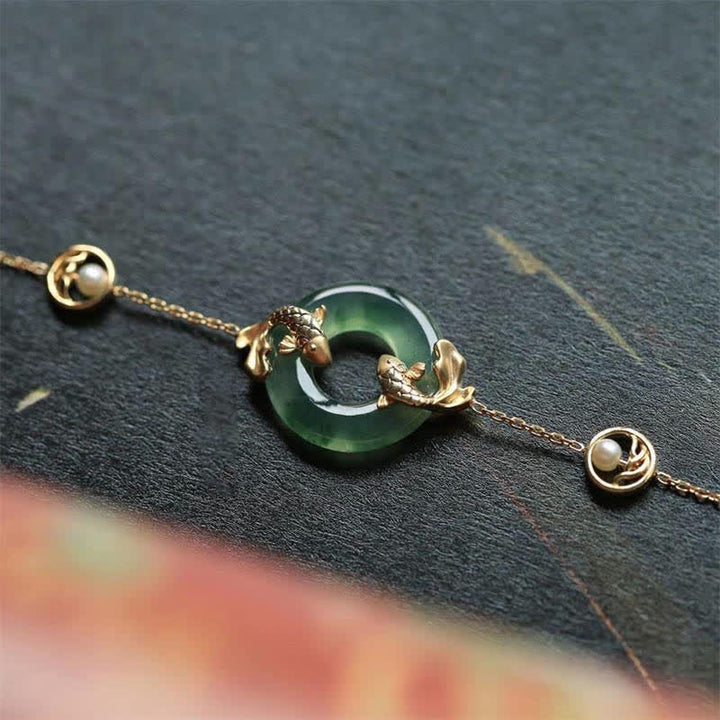 Braccialetto di armonia curativa con pesce koi in giada ciano Buddha Stones