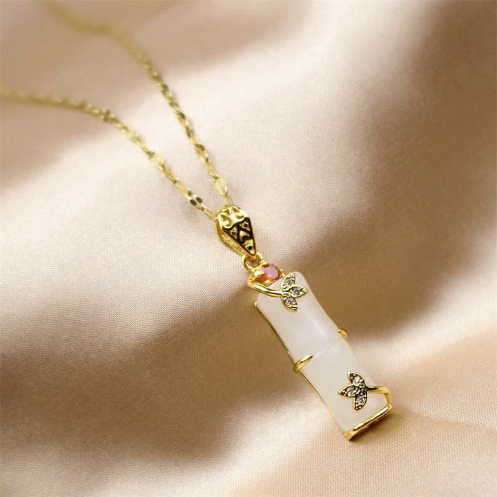 Collana con ciondolo di protezione dalla fortuna in bambù, giada bianca e giada ciano Buddha Stones