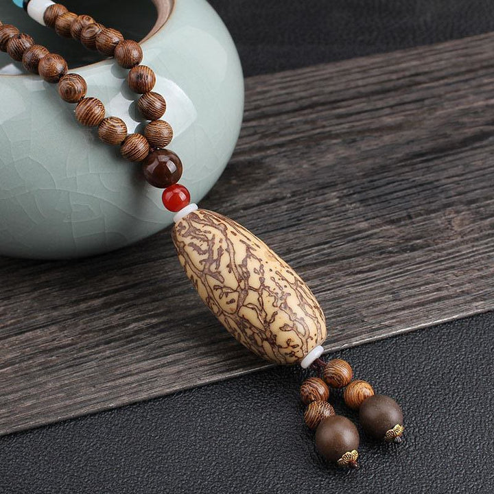 Buddha Stones Tibetano Legno Wenge Bodhi Seme Agata Equilibrio Pace Collana Pendente