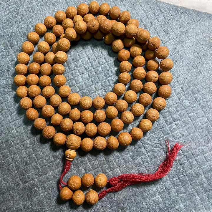 Buddha Stones 108 Mala Beads Nepal Bodhi Seed Fortuna Ricchezza Braccialetto con Nappa