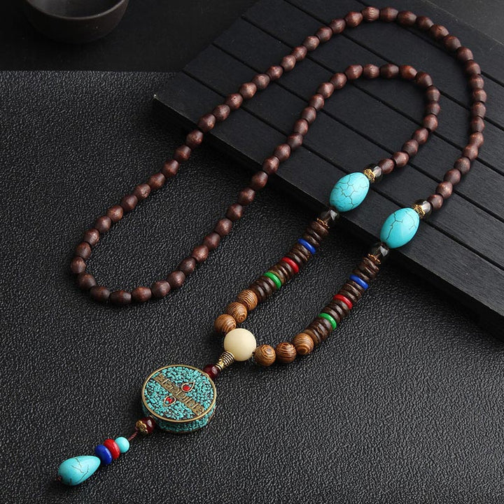 Collana di meditazione in legno di wenge con perline di Dzi in turchese Buddha Stones