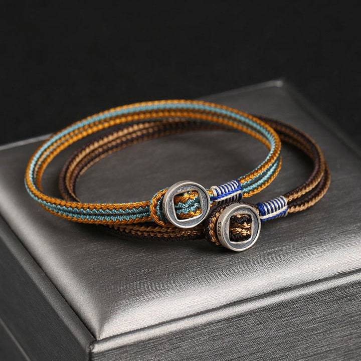 Braccialetto con cordino intrecciato di protezione con bottone fatto a mano in argento sterling 925 Buddha Stones