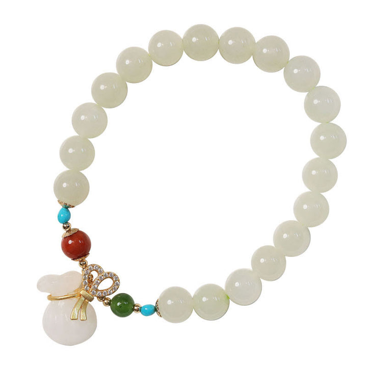 Braccialetto di benedizione con sacco di soldi placcato oro 14K in giada bianca naturale di Hetian Buddha Stones