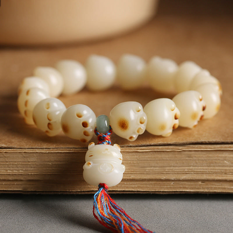 Braccialetto dell'armonia con zampa di gatto con semi di Bodhi e gatto fortunato Buddha Stones - Nappa colorata con zampa di gatto e semi di Bodhi - image 1