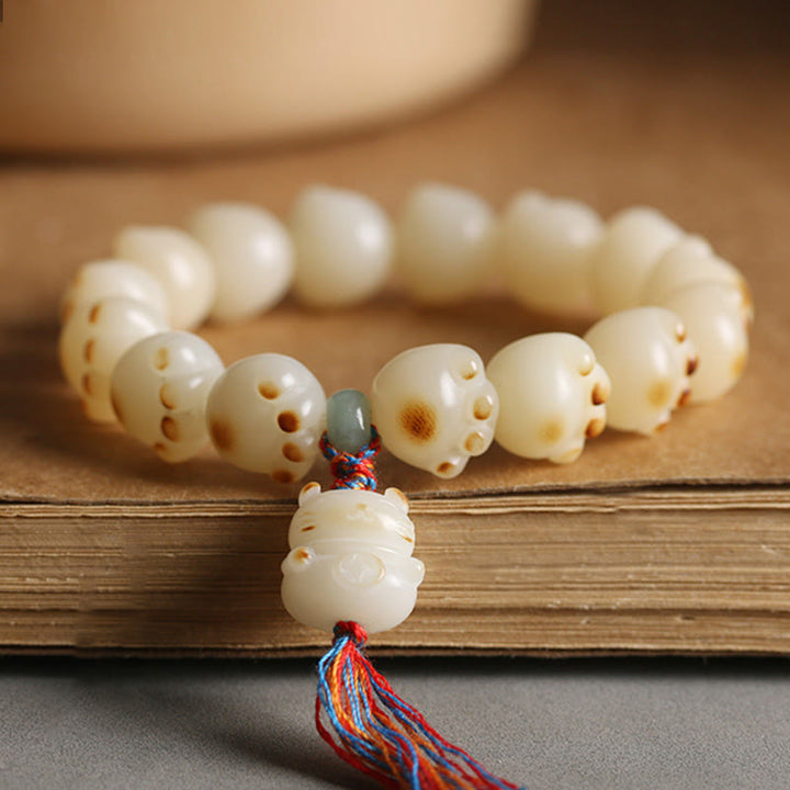 Braccialetto dell'armonia con zampa di gatto con semi di Bodhi e gatto fortunato Buddha Stones - Nappa colorata con zampa di gatto e semi di Bodhi - image 1