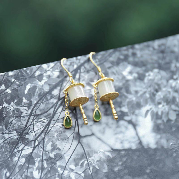 Orecchini pendenti con ruota della preghiera in giada e argento sterling 925 Buddha Stones