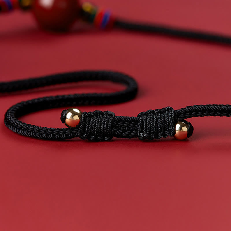 Collana con ciondolo in corda di benedizione con perline di cinabro e Buddha Stones