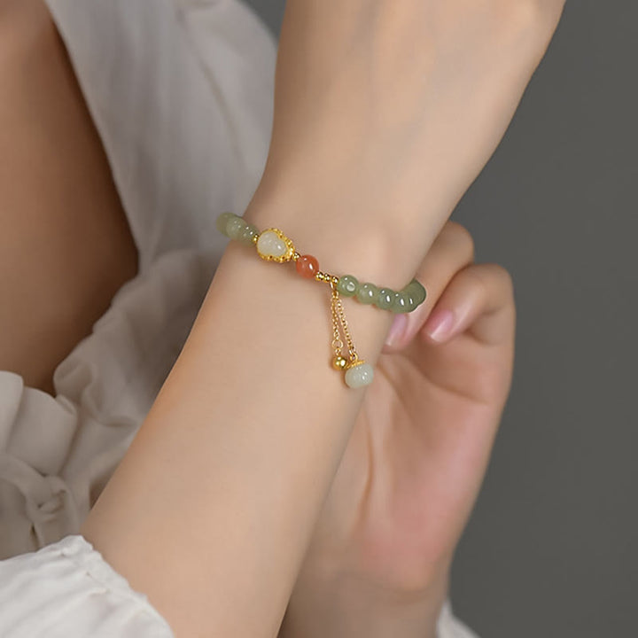 Braccialetto portafortuna in argento sterling 925 con giada Hetian e zucca di loto