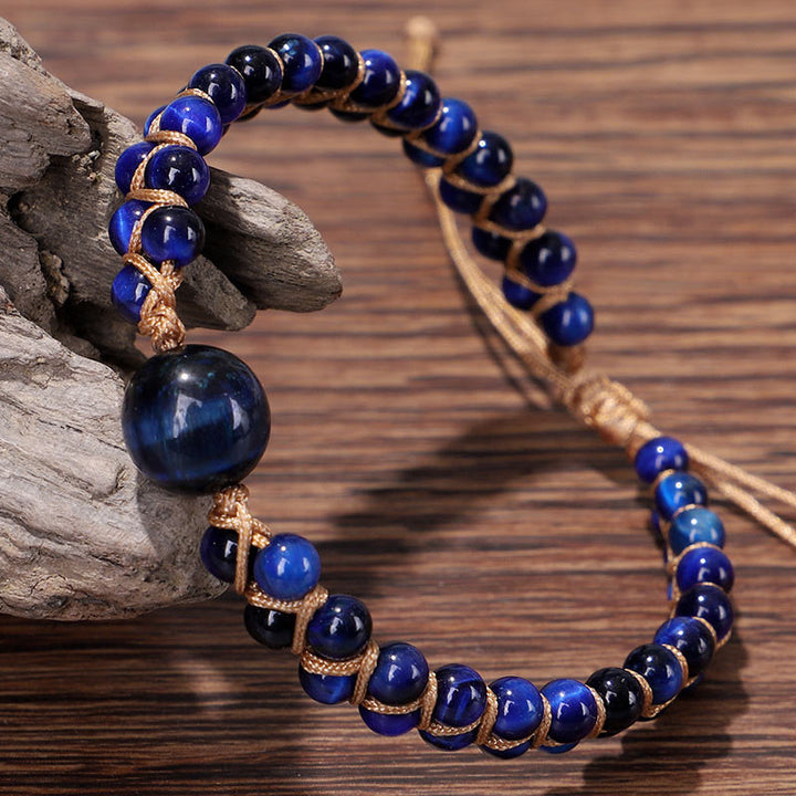 Braccialetto di protezione in pietra divina occhio di tigre blu Buddha Stones