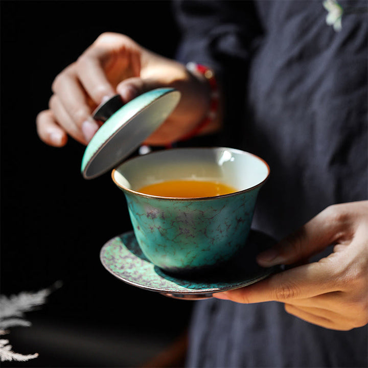 Buddha Stones Retro Green Glaze Ceramic Gaiwan Sancai Tazza da tè Kung Fu Tazza da tè e piattino con coperchio