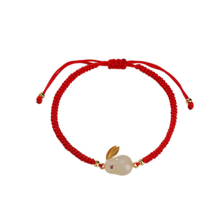 Braccialetto di protezione con corda rossa e giada bianca Hetian dell'anno del coniglio in argento sterling 925 Buddha Stones