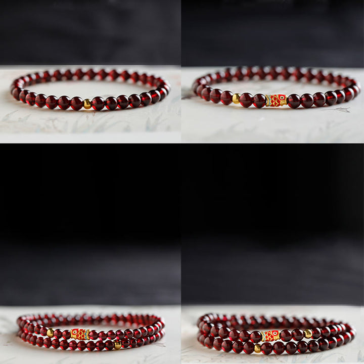 Braccialetto di protezione in granato naturale con pesce koi in oro 999 Buddha Stones
