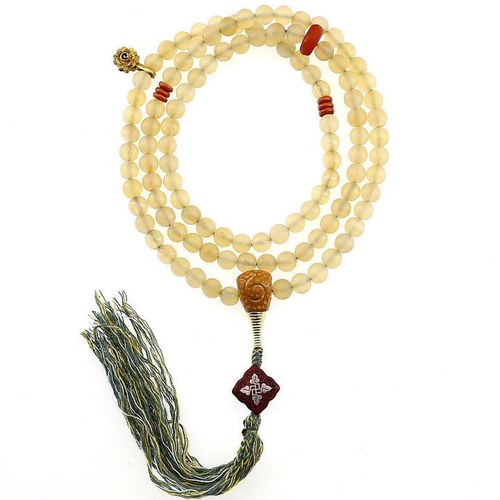 Braccialetto della fortuna in ambra e corno di pecora del Tibet con 108 perle di Mala Buddha Stones