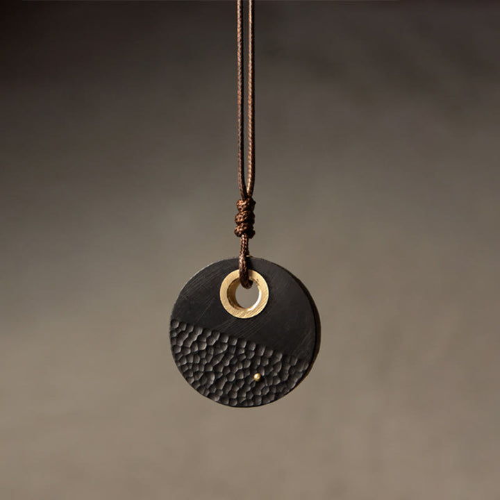 Collana con ciondolo in legno di ebano e rame, realizzata a mano , Buddha Stones, simbolo della pace