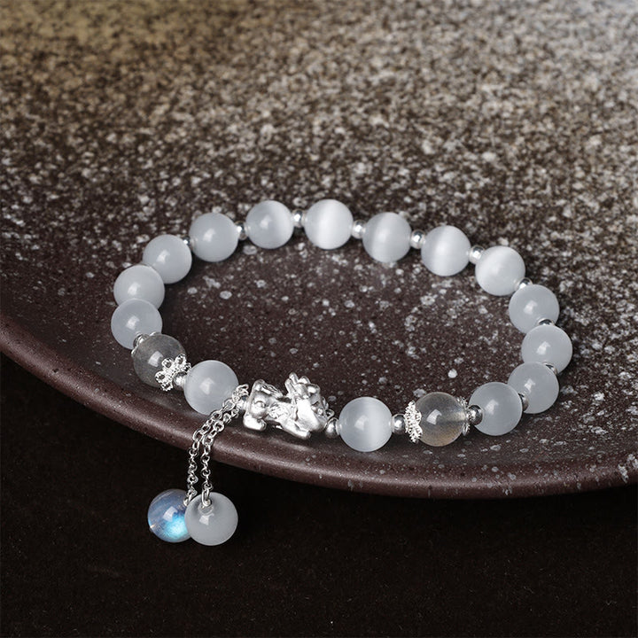 Braccialetto di supporto PiXiu in quarzo fragola con pietra lunare naturale occhio di gatto Buddha Stones