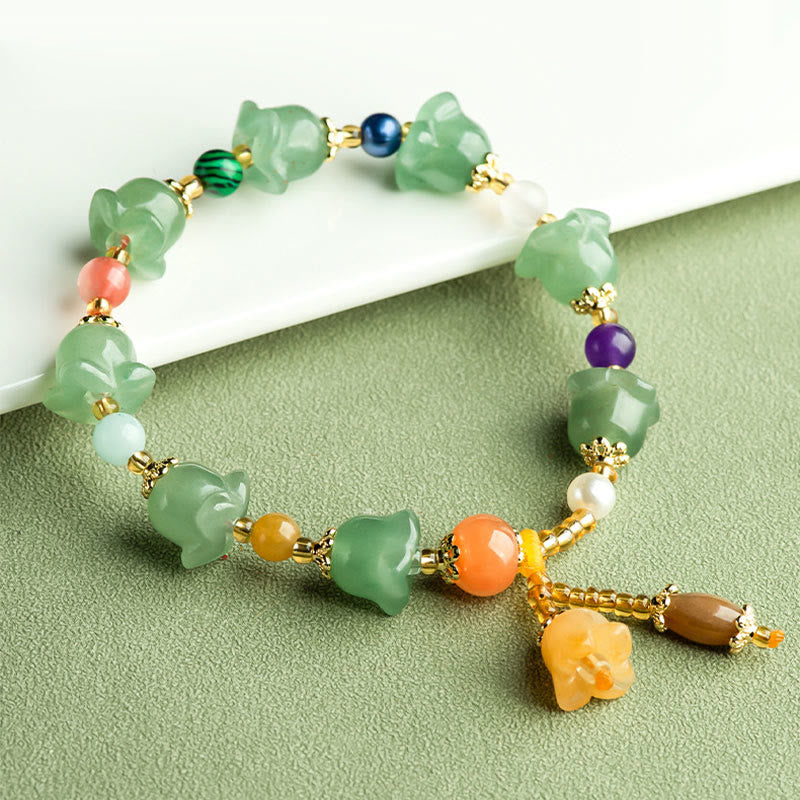 Braccialetto della fortuna con fiore di magnolia, avventurina verde Buddha Stones