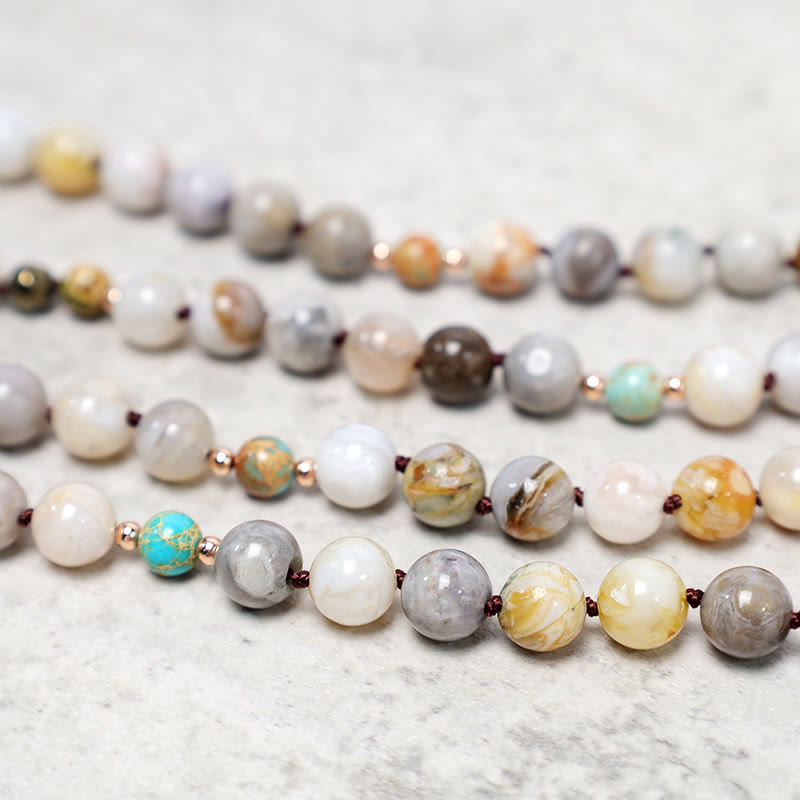 Collana di perline di guarigione in diaspro Picasso naturale dell'oceano Buddha Stones