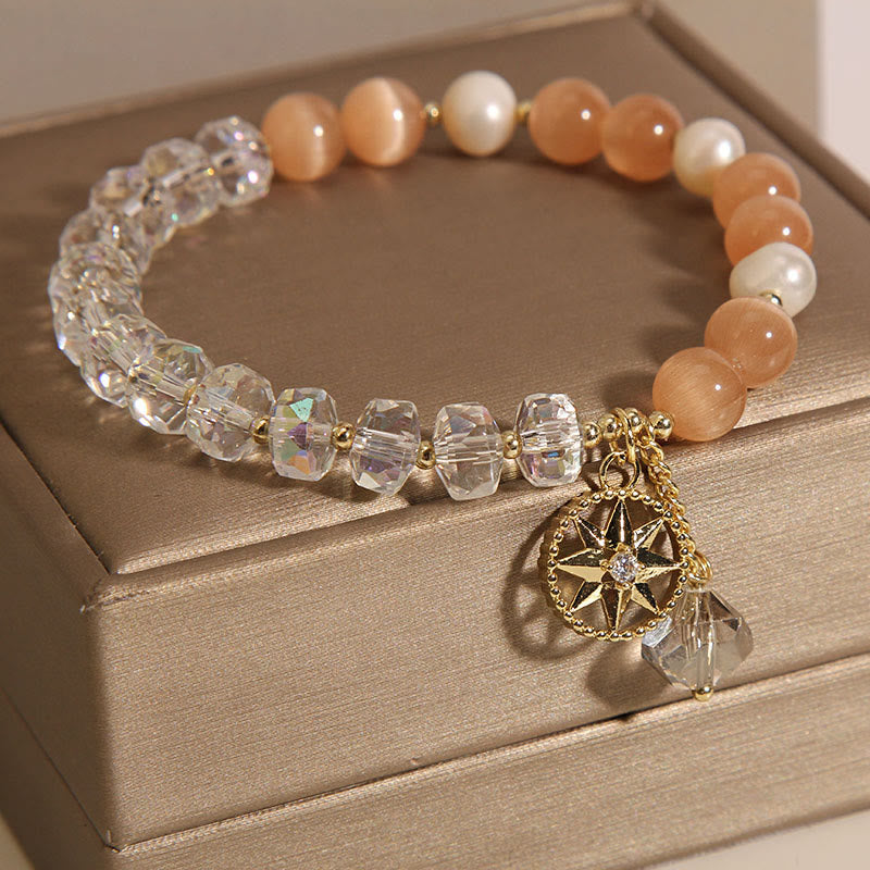 Braccialetto di supporto con stella di cristallo bianco e occhio di gatto arancione Buddha Stones