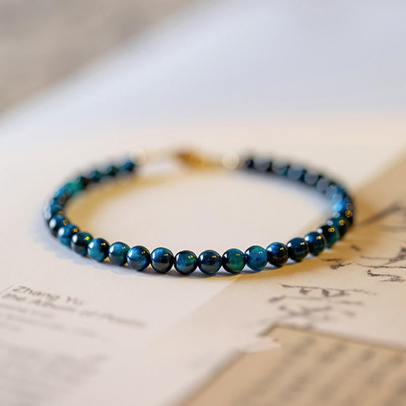 Braccialetto di protezione con catena in pietra naturale occhio di tigre blu Buddha Stones