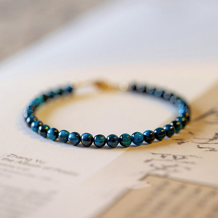 Braccialetto di protezione con catena in pietra naturale occhio di tigre blu Buddha Stones
